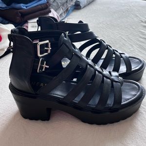 Black strappy platforms